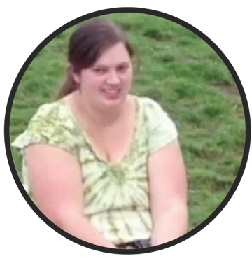 Mikaela before losing weight. Sitting on the ground and out of energy